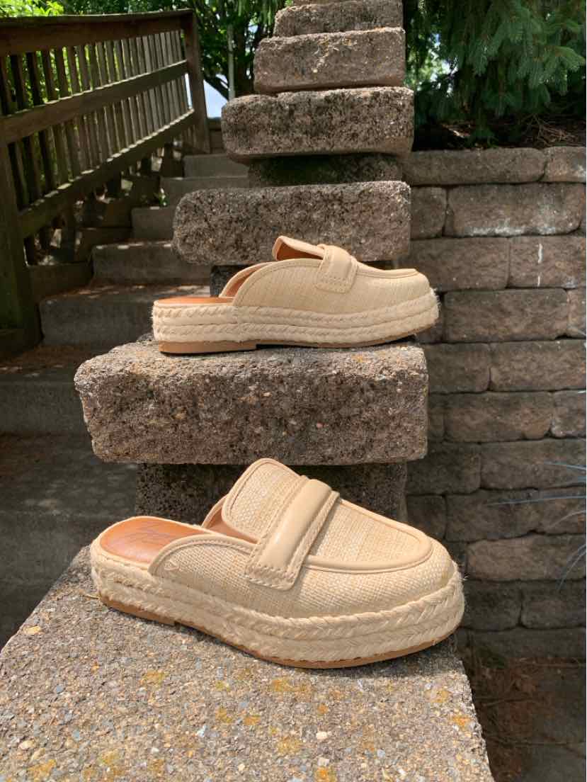Tan slip-on platform shoes with woven texture and stitched detailing, size 8.