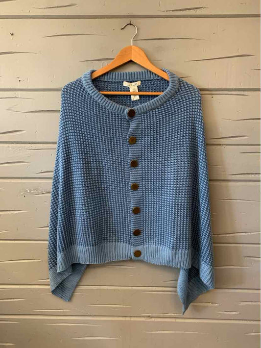 Blue textured knit cardigan with a relaxed fit, wide sleeves, and brown front buttons.
