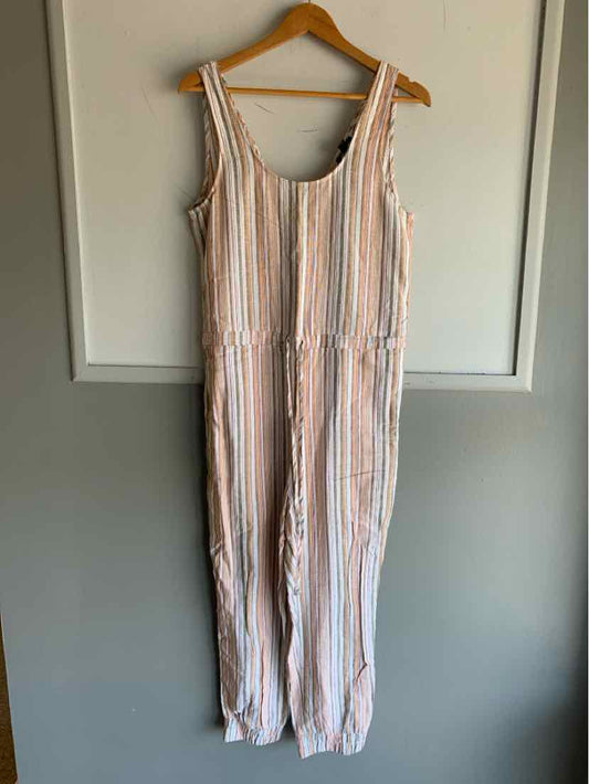 Sleeveless jumpsuit with vertical orange, white, and blue stripes, scoop neckline, and cinched waist.