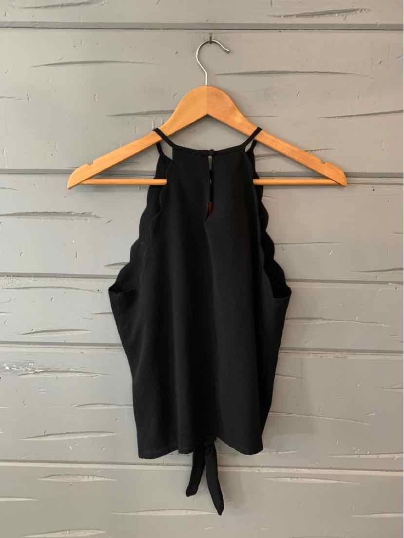 Black sleeveless blouse with a high neckline and tie detail at the hem, made of flowy fabric.
