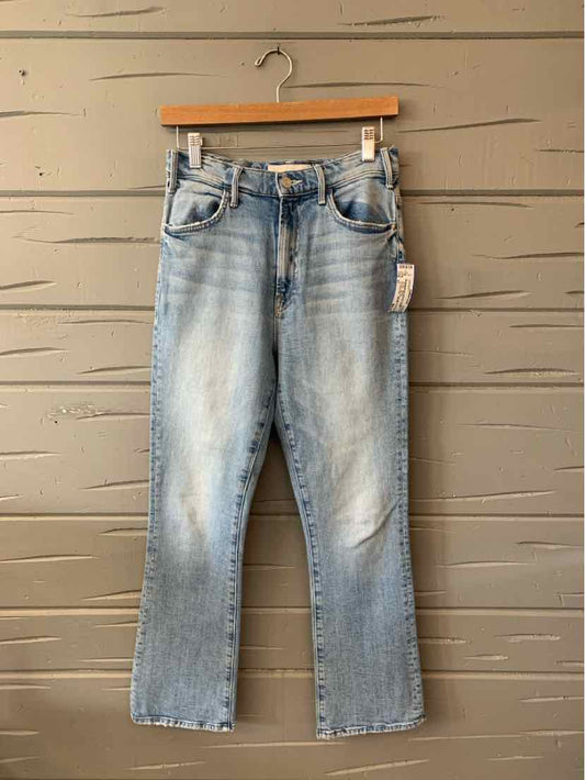 Light blue high-rise straight-leg jeans with slight fading and five-pocket styling.