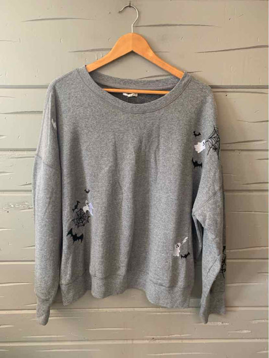 Gray crewneck sweatshirt with black and white spider web and spider designs on sleeves and front, in size XXL.
