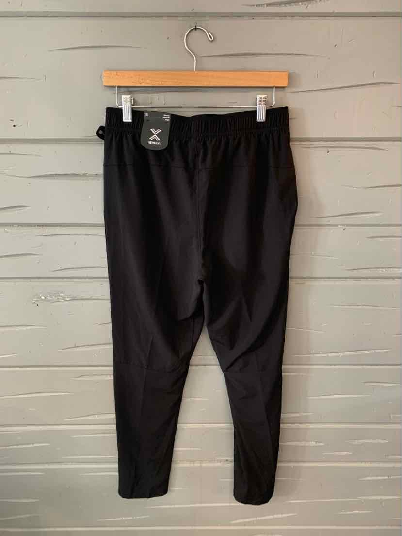 Black tapered athletic pants with elastic waistband and smooth fabric, size small.