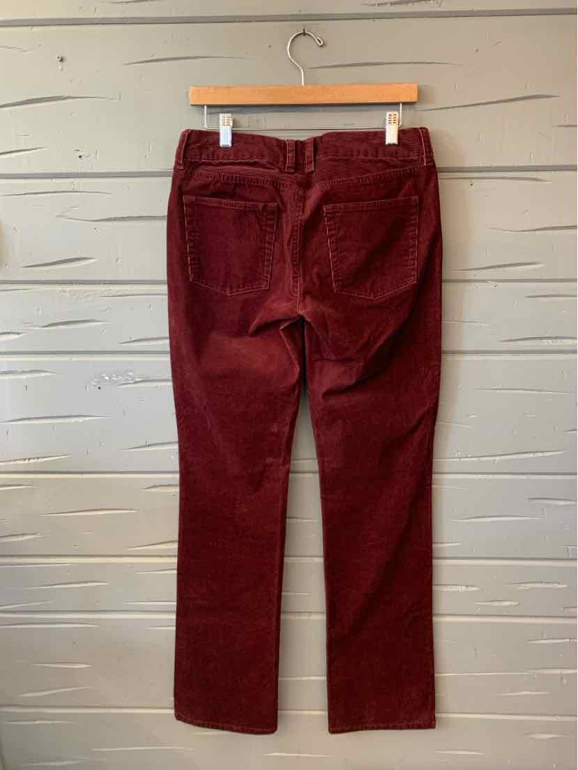 Women’s burgundy J.Crew pants with a straight-leg cut, belt loops, and back welt pockets.