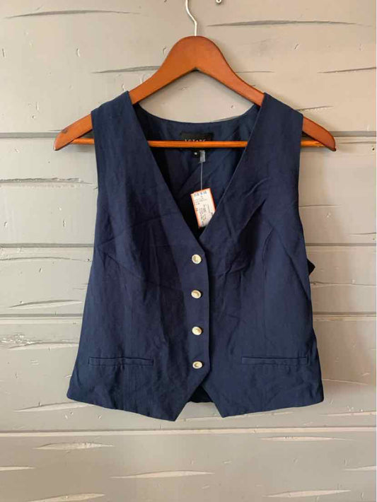 Navy blue sleeveless vest with five silver buttons and a V-neckline on a wooden hanger.