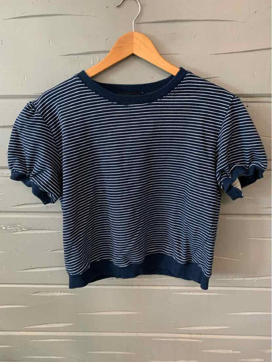 Navy and white striped short-sleeve sweater with ribbed cuffs and hem on wooden hanger.