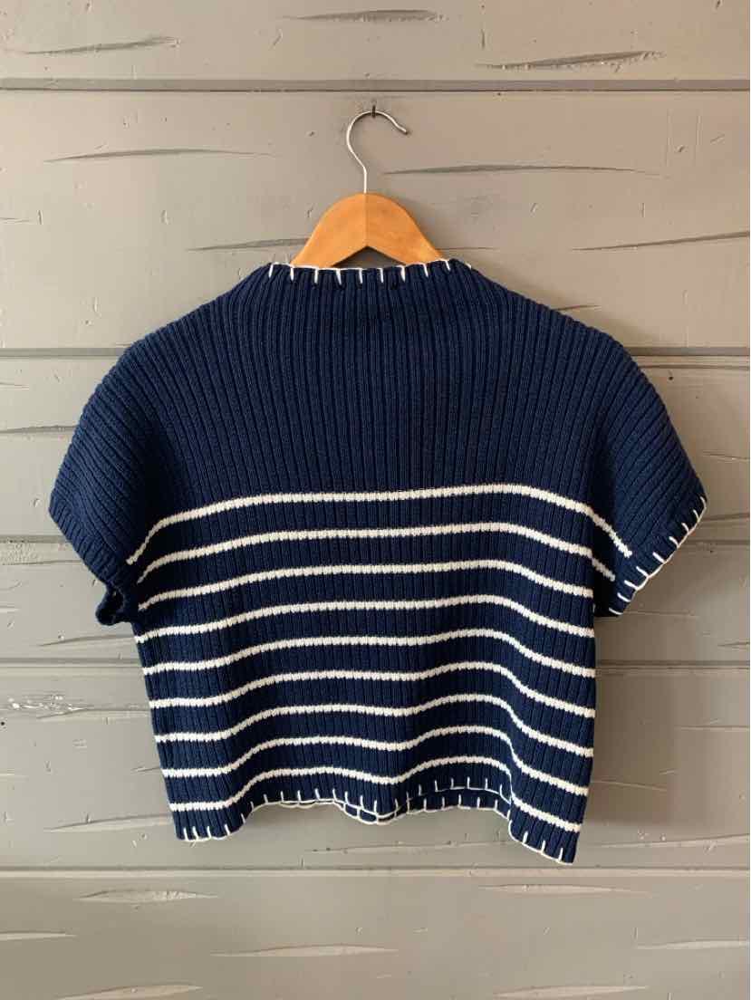 Navy blue knit cropped sweater with white horizontal stripes and short sleeves.