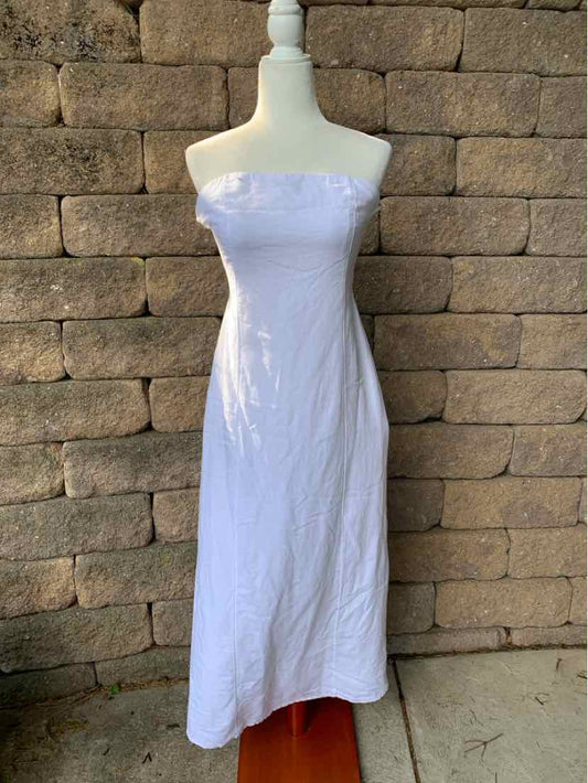 White strapless midi dress with a form-fitting bodice and straight hemline.