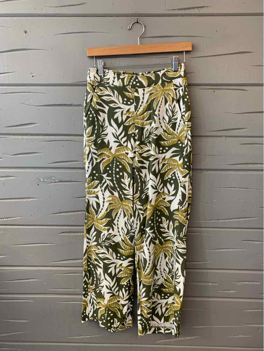 Lightweight tropical print pants with green, white, and mustard leaf patterns, slim fit, size small.