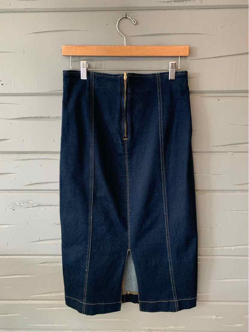 Dark indigo denim pants with a high waist, belt loops, front zipper, and wide straight legs.