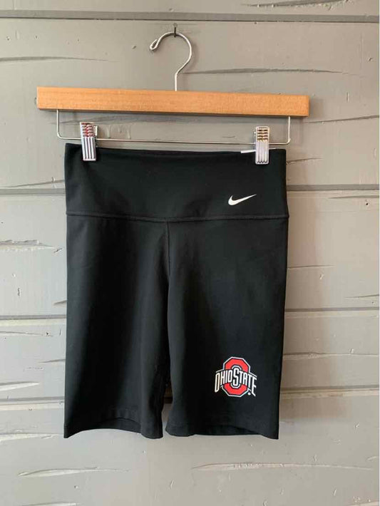 Black Nike athletic shorts with white swoosh logo on left thigh and Ohio State logo on right thigh.