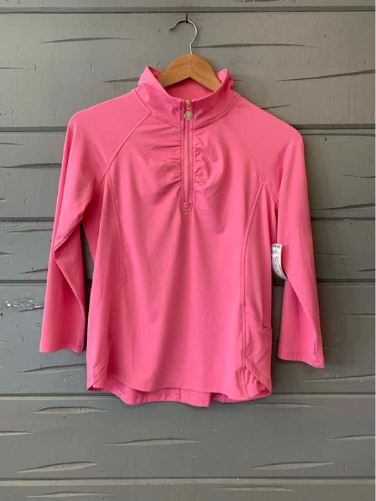 Pink long-sleeve pullover with quarter-zip and ruched high collar on wooden hanger.
