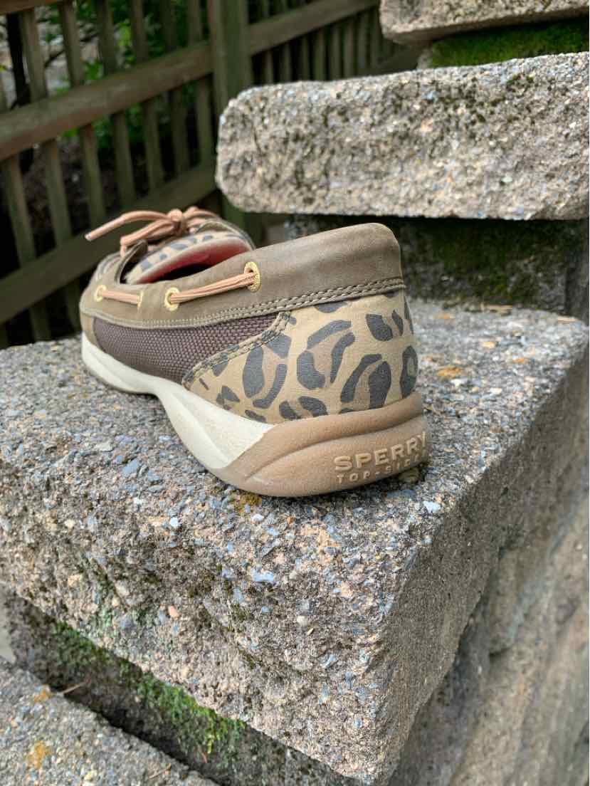 Brown leather and leopard print boat shoe with beige laces and white sole, size 11.