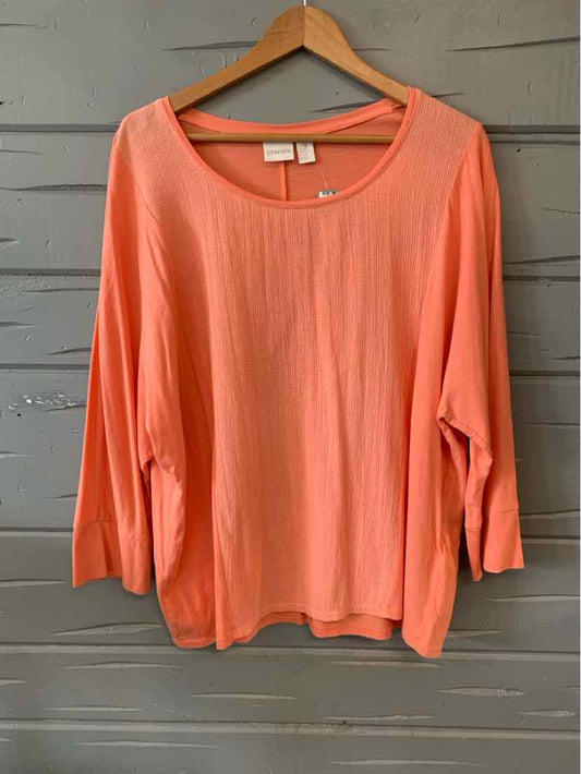 Coral orange long-sleeve blouse with round neckline and relaxed fit in size 2XL.