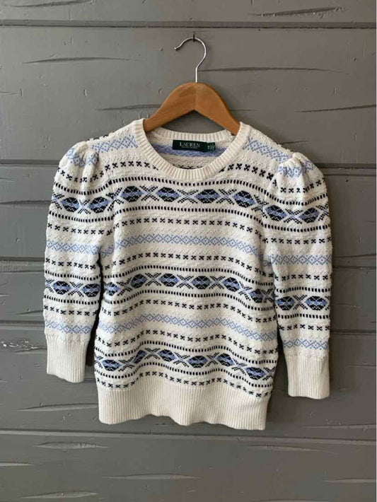 Cream and navy Fair Isle knit sweater with puffed sleeves and ribbed cuffs, size small.