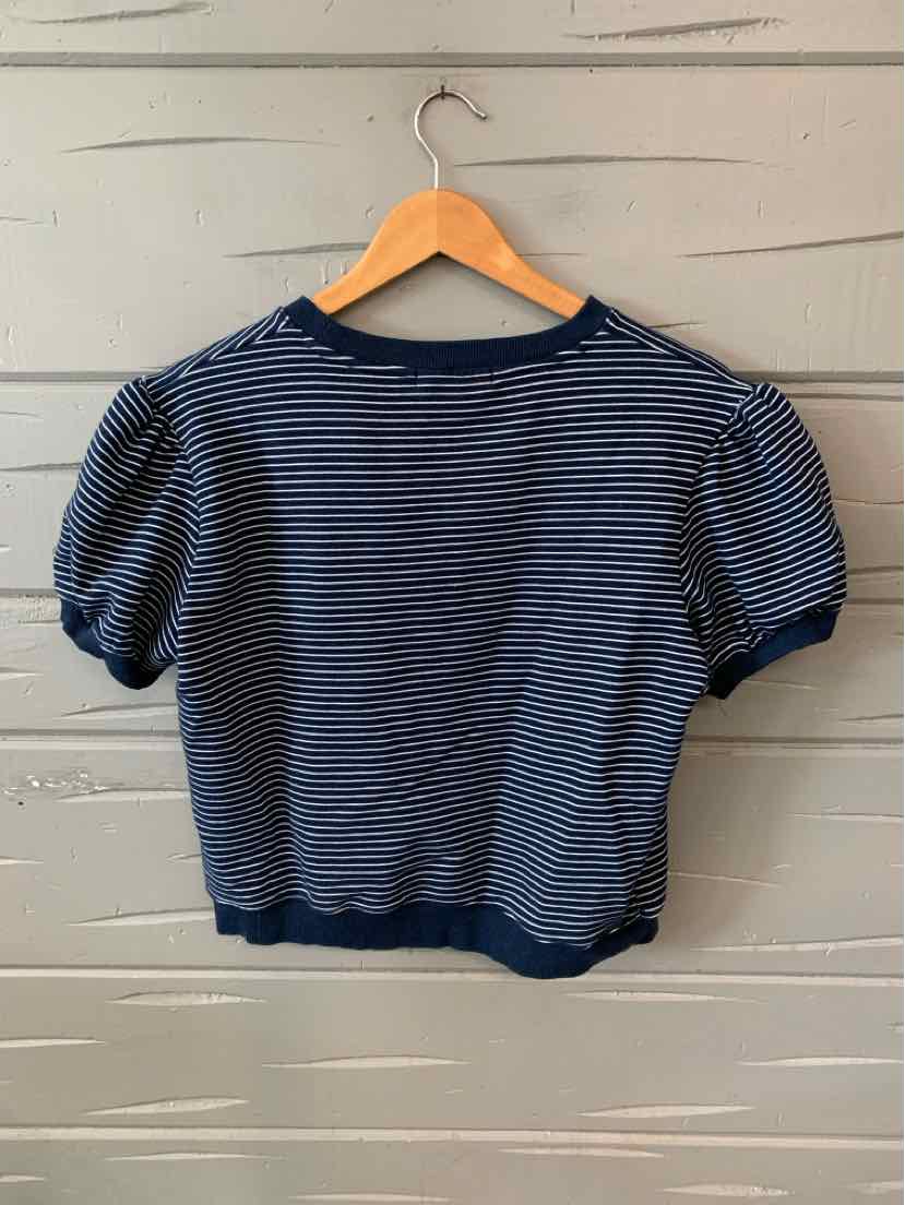 Navy blue and white striped short-sleeve top with puffed sleeves and fitted waistband on wooden hanger.
