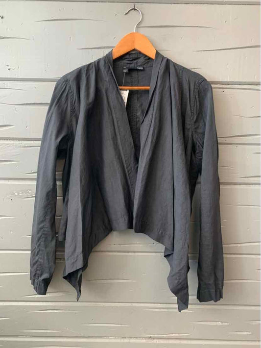 Black long-sleeve open-front lightweight cardigan with draped collar on wooden hanger.