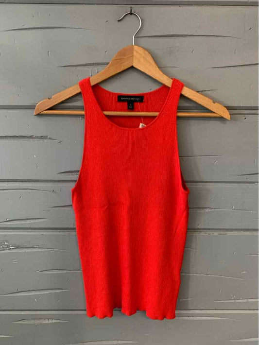 Red sleeveless ribbed knit tank top with crew neckline and fitted silhouette on wooden hanger.