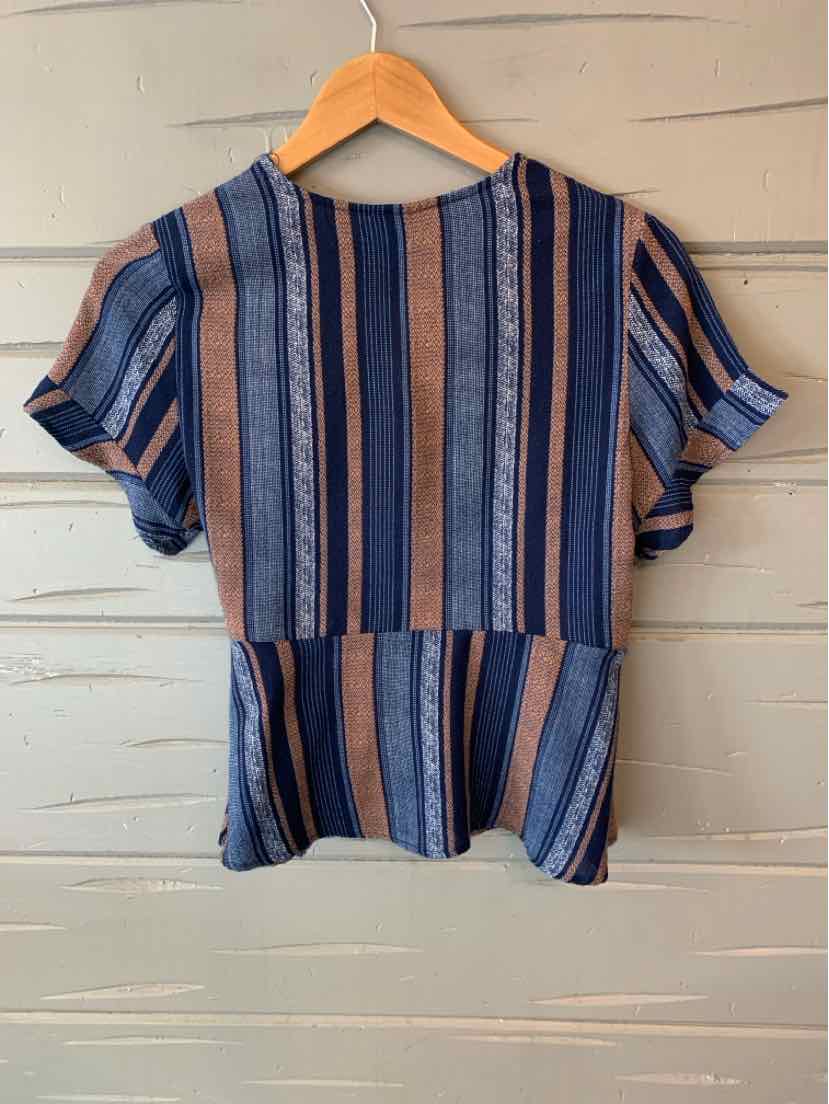 Blue and brown vertical striped short-sleeve blouse with peplum hem on wooden hanger.