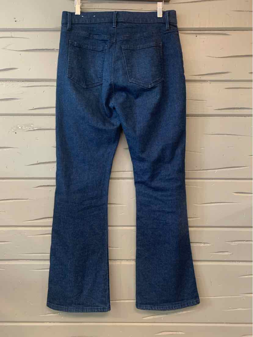 Dark blue denim jeans in size 6 with a slight flare leg and back pockets.