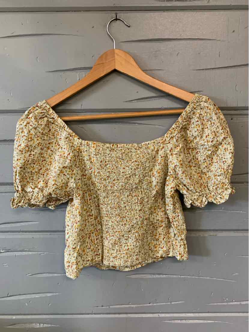 Tan floral puff sleeve blouse with square neckline and smocked back in size XS.