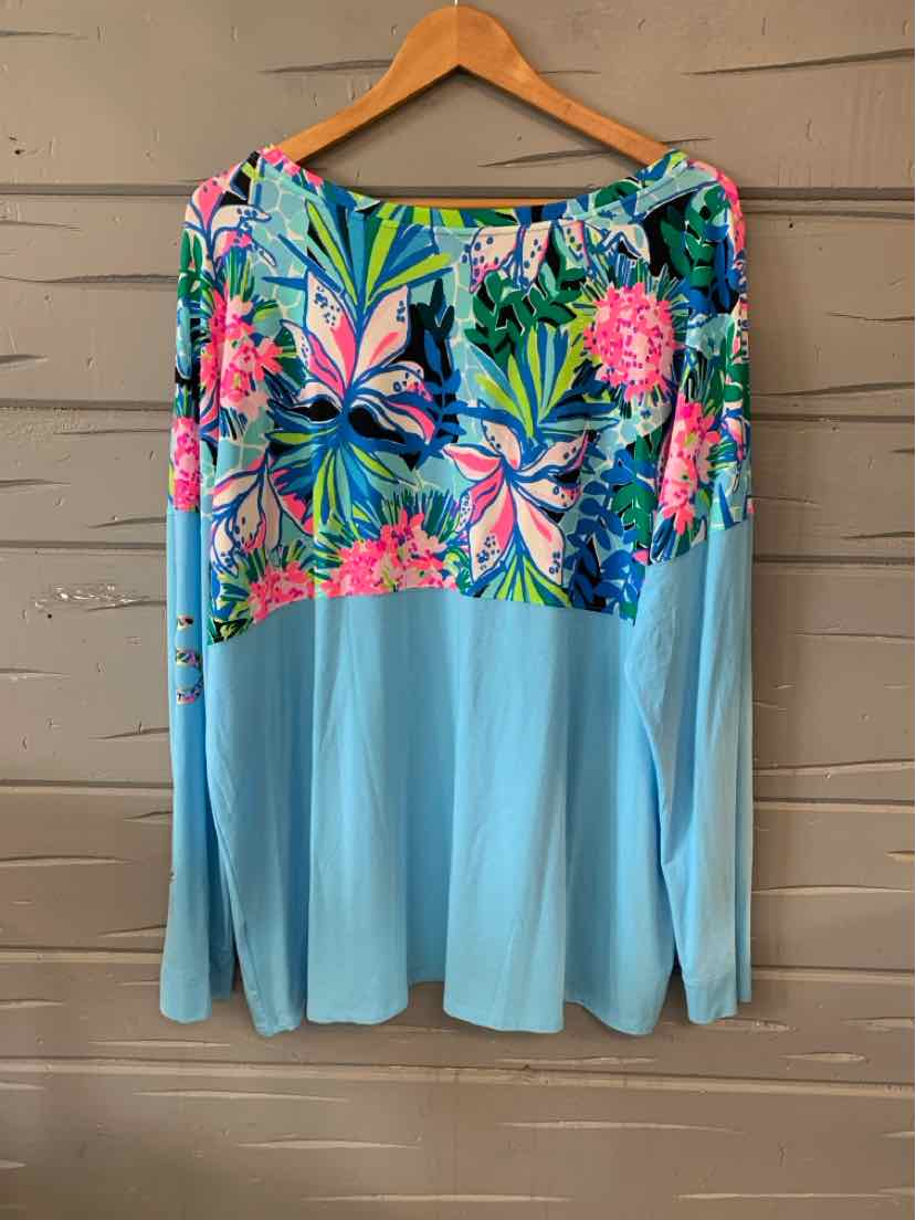 Light blue long-sleeve top with colorful tropical floral print across the chest and shoulders, size XXL.