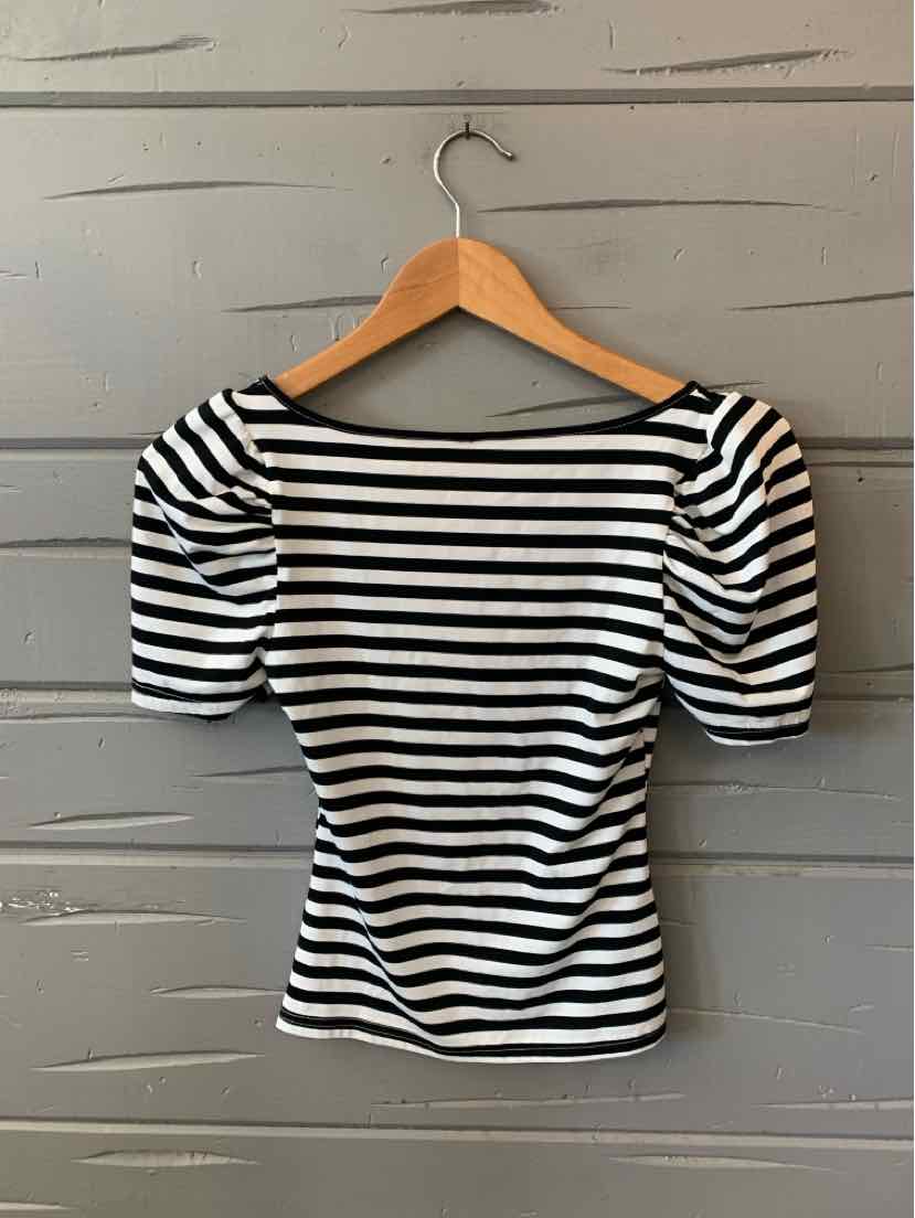 Black and white striped fitted top with puff sleeves and square neckline on wooden hanger.