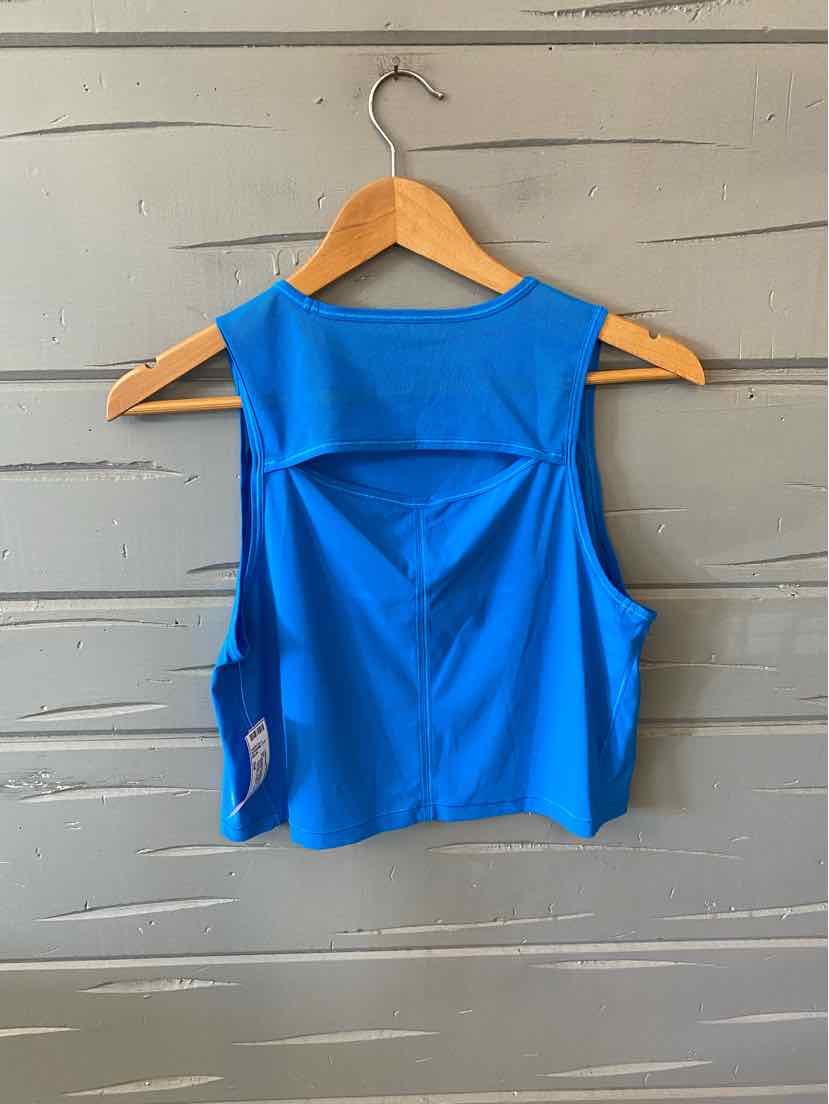 Bright blue sleeveless athletic crop top with racerback and mesh ventilation panels.