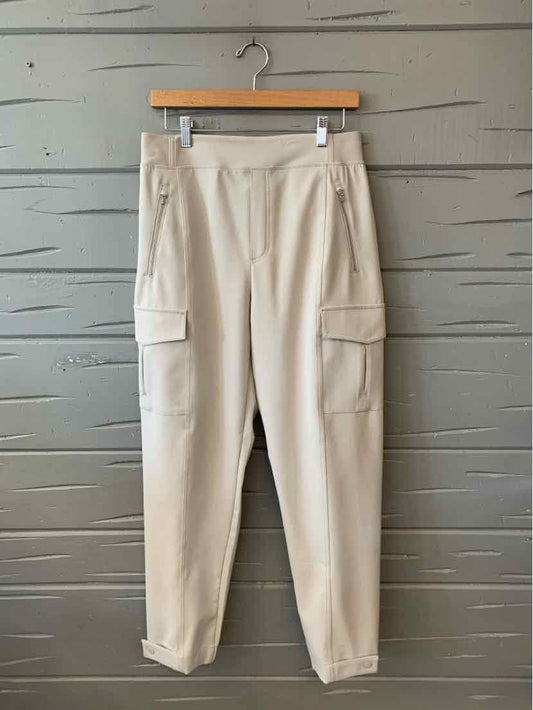 Beige cargo jogger pants with side pockets and elastic cuffs, size 10.