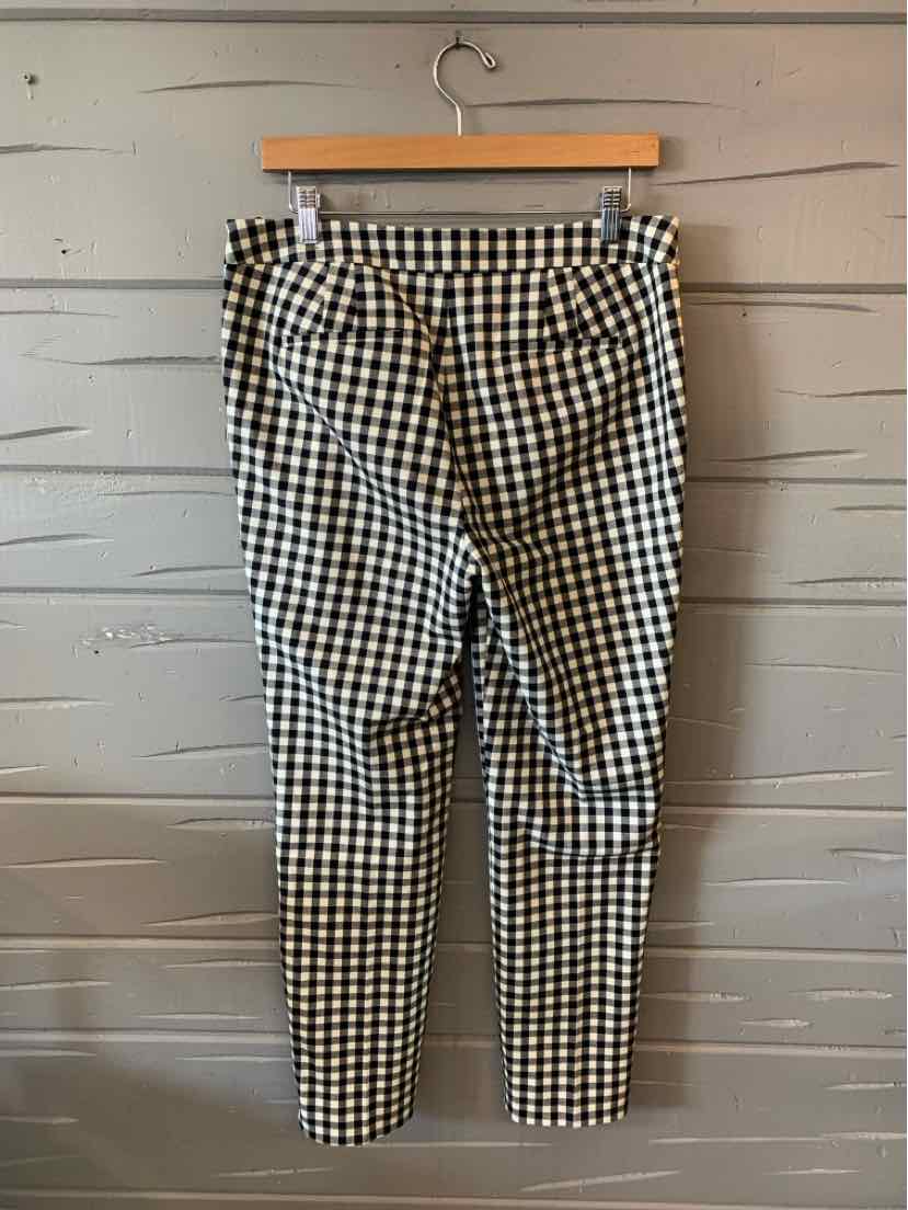 Black and white gingham tapered pants with belt loops and front pockets, size 8.