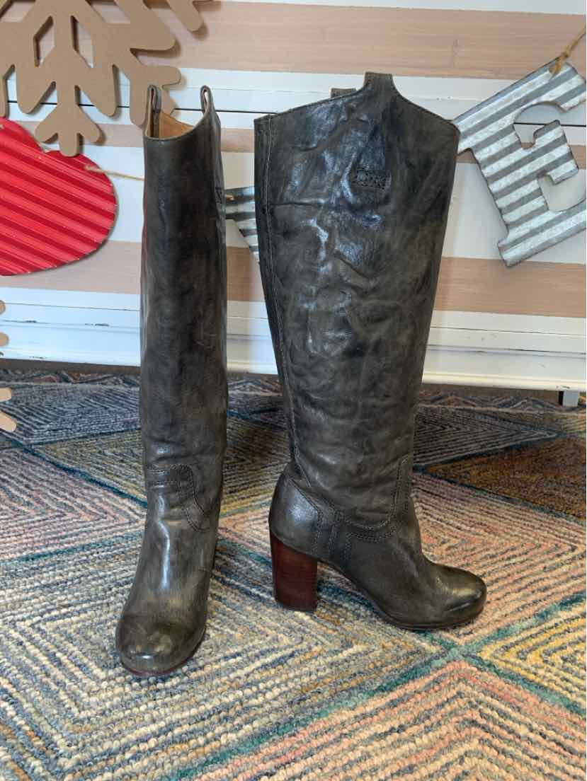 Dark gray leather knee-high boots with wooden heels, classic western style.