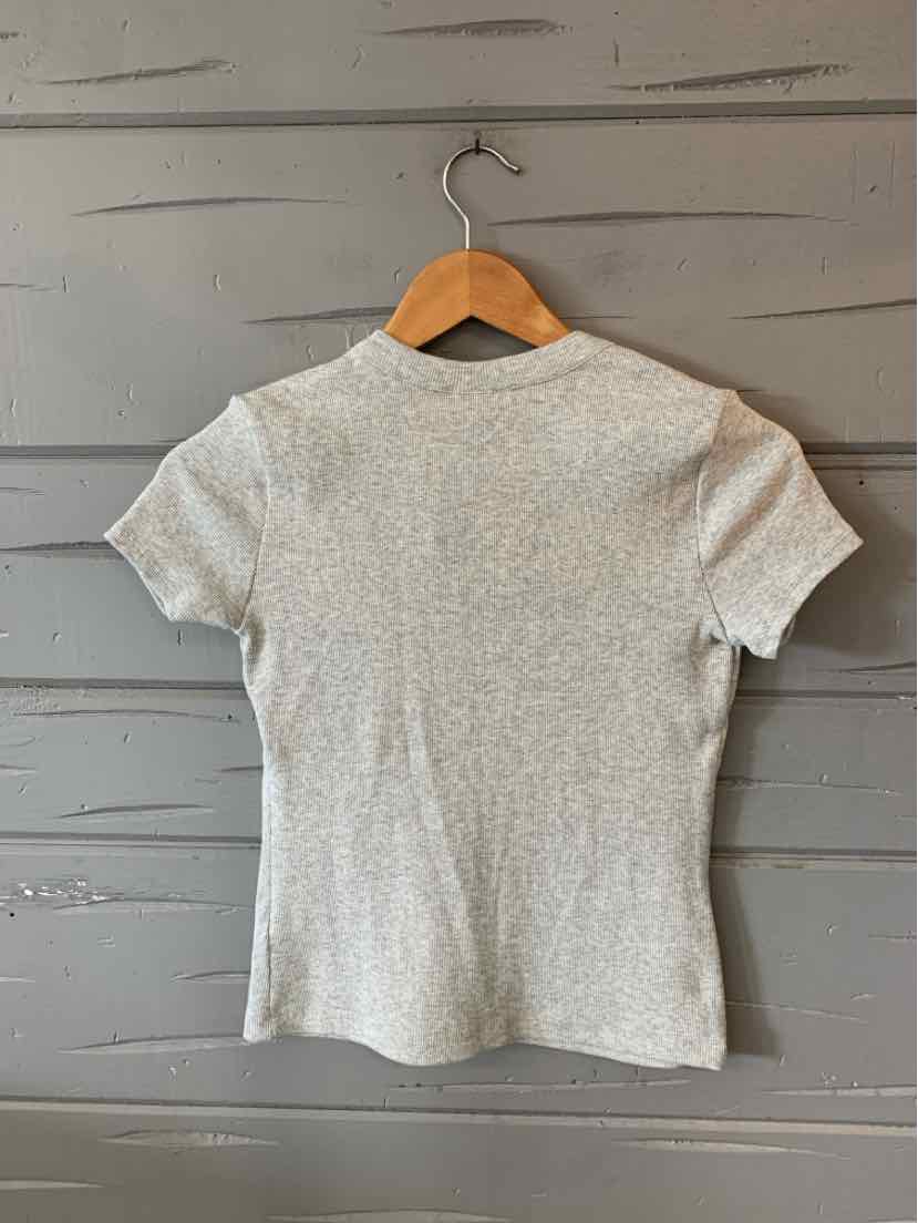 Heather gray short-sleeve fitted T-shirt with crew neck, hanging on wooden hanger.