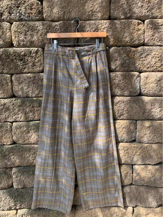 High-waisted wide-leg plaid pants with belt loops and self-tie waist in muted gray and yellow tones.