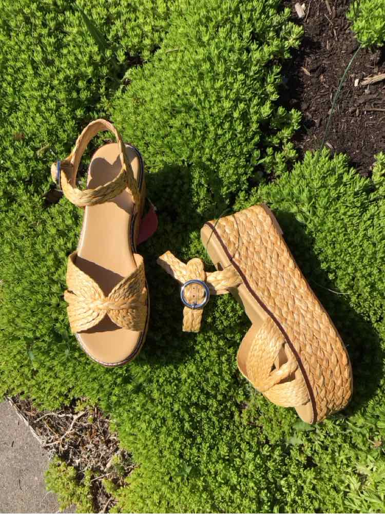 Woven straw wedge sandal with ankle strap and buckle in tan color, size 9.