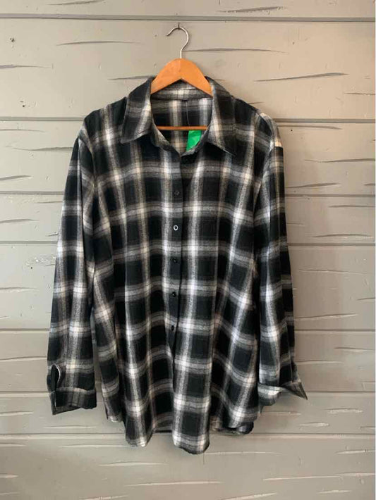 Black and white plaid casual top with long sleeves and button-up front for women's fashion.