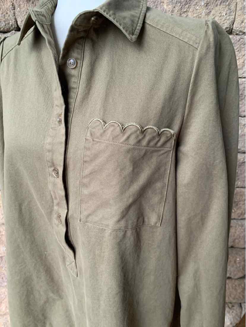 Olive green button-up shirt with pointed collar and chest pocket featuring subtle scalloped edge detailing.