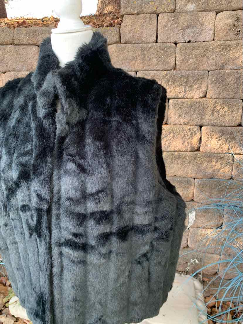 Black faux fur sleeveless vest with high collar, textured plush fabric, size L/XL.