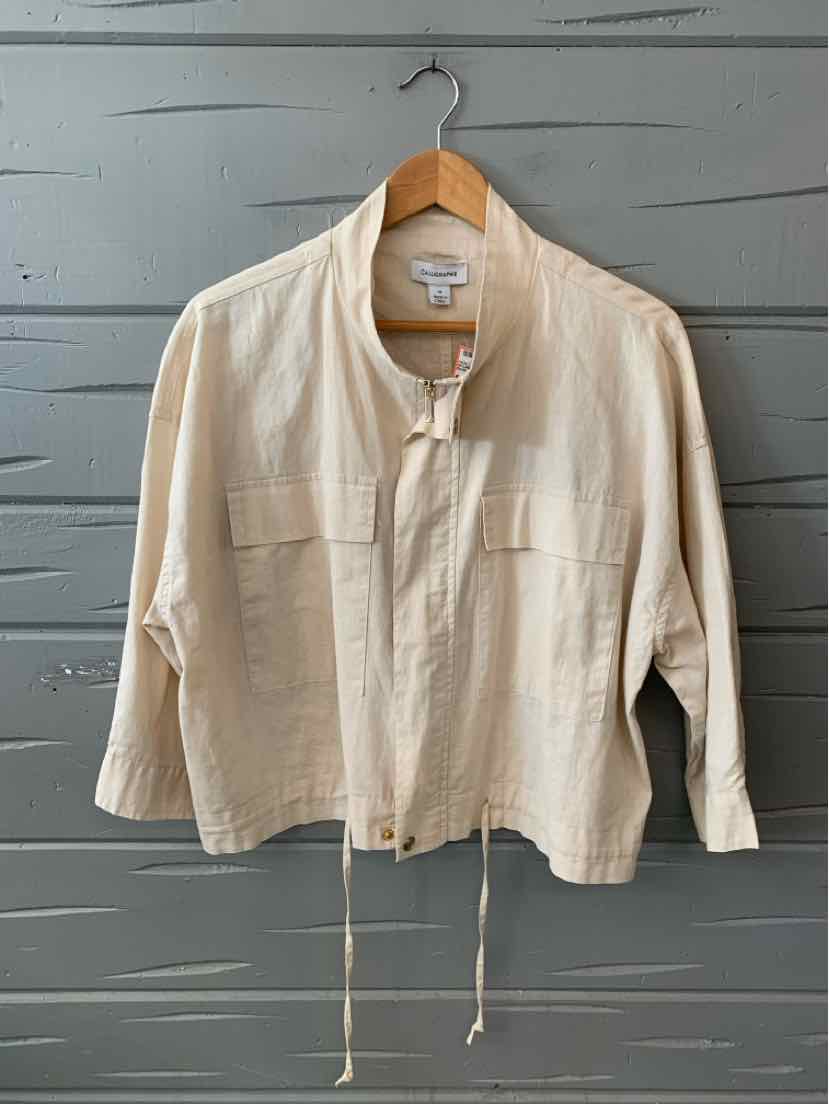 Cream-colored lightweight jacket with a stand collar, front zip, two chest pockets, and adjustable drawstrings at the hem.