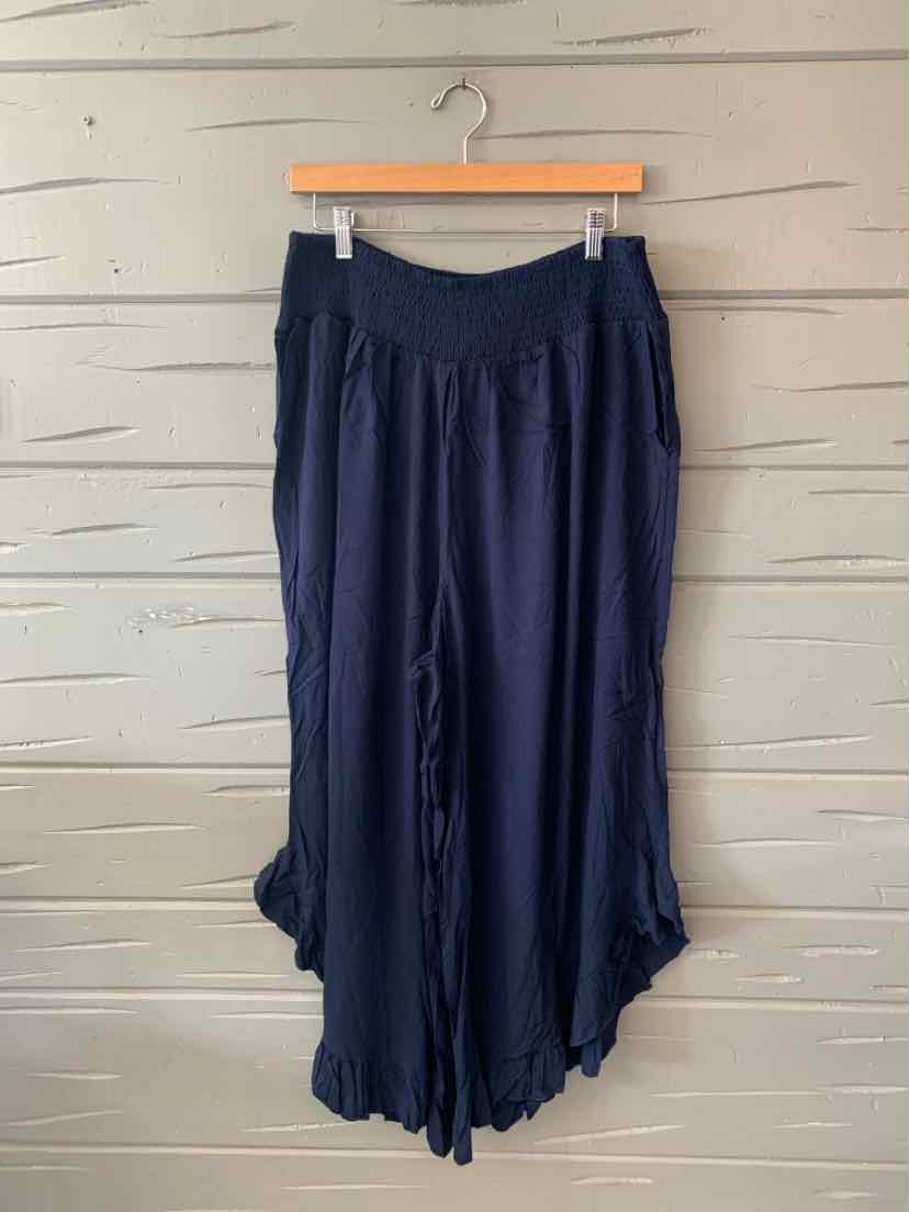Navy blue wide-leg pants with gathered waistband and ruffled hem, size 18-20.