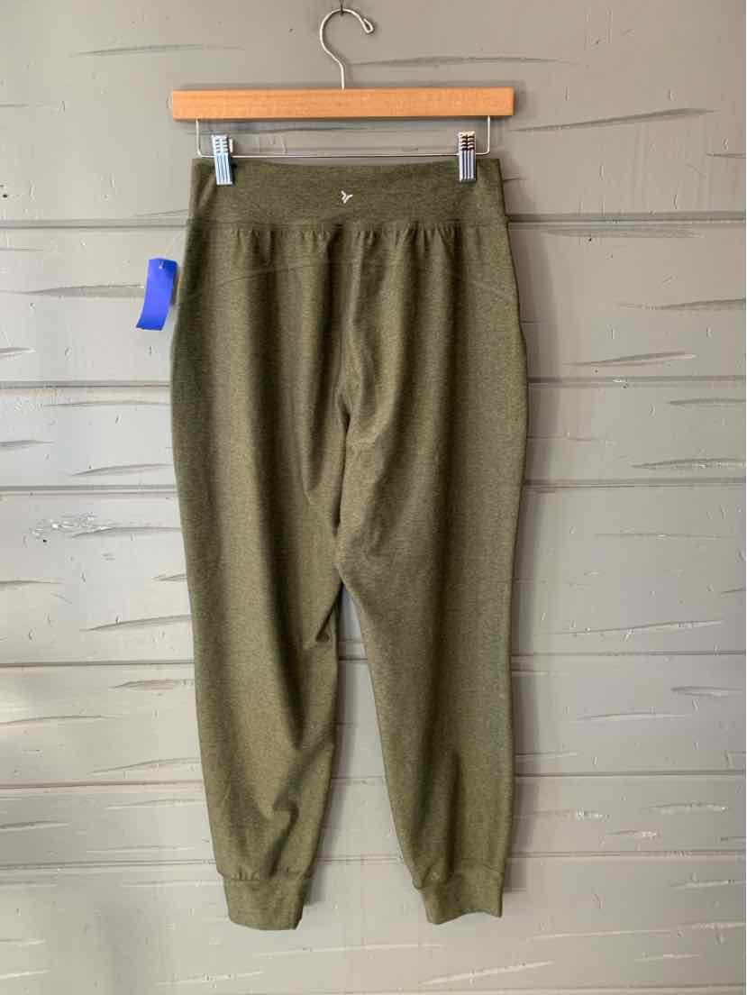 Olive green Old Navy pants with an elastic waistband, drawstring, and tapered cuffs.