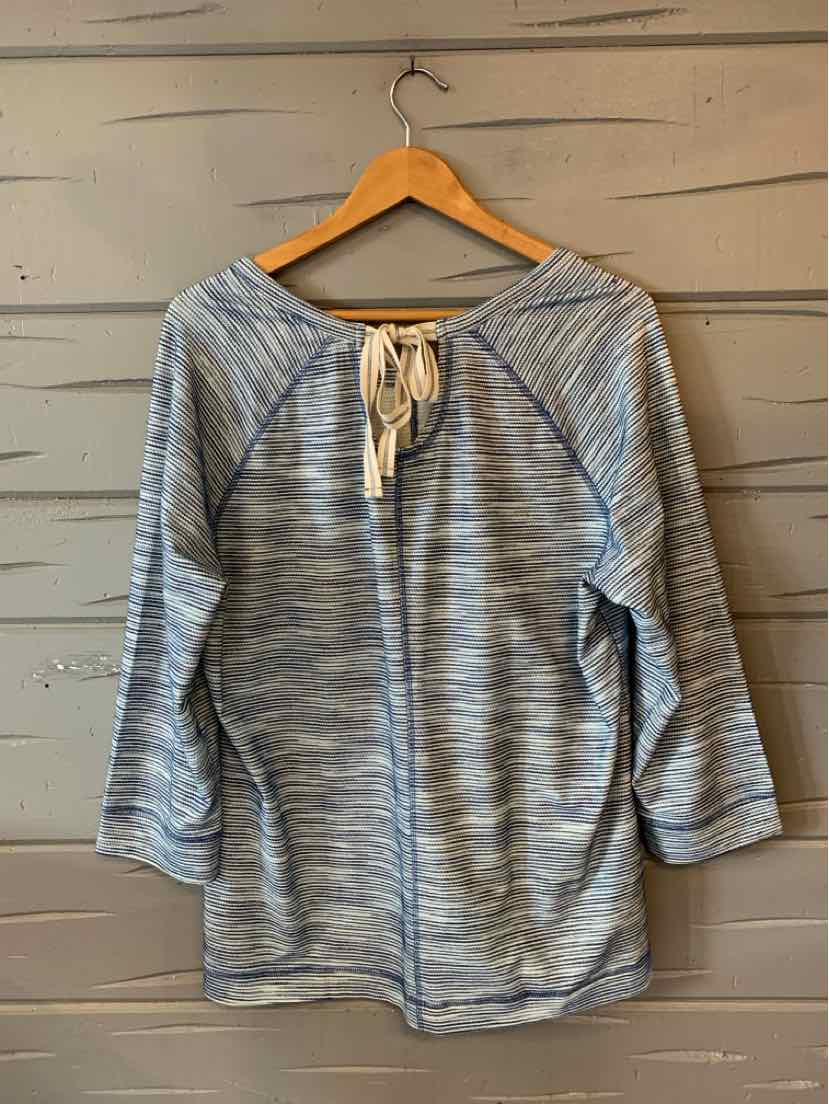 Light blue and white striped long sleeve top with back tie detail and relaxed fit.