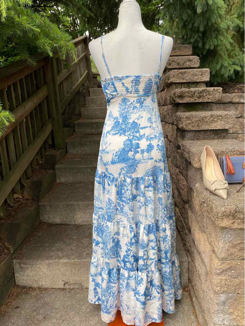 Blue and white floral maxi dress with spaghetti straps and tiered skirt, size 0.