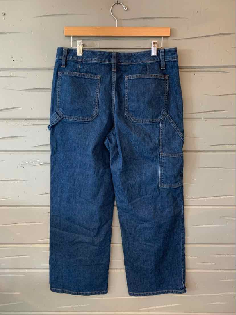 Dark blue denim jeans with straight legs, dual back pockets, and a side utility pocket.