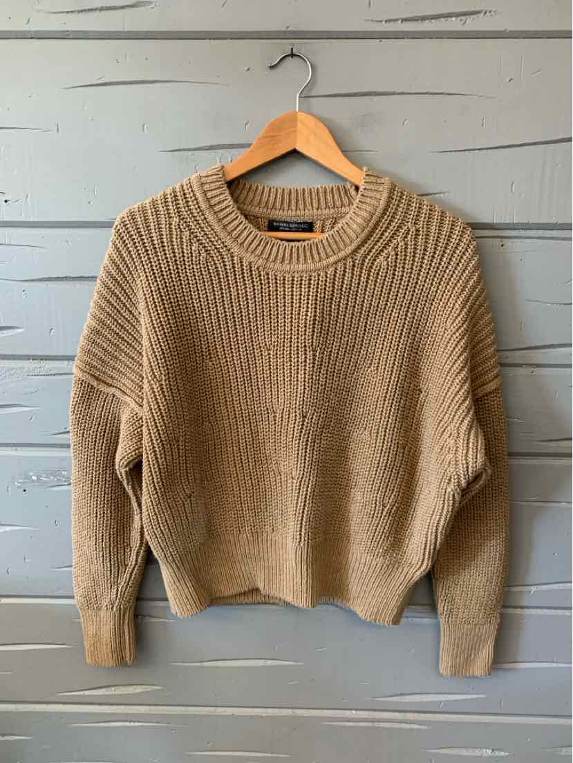 Tan ribbed knit Banana Republic sweater with a crew neck, long sleeves, and relaxed fit.