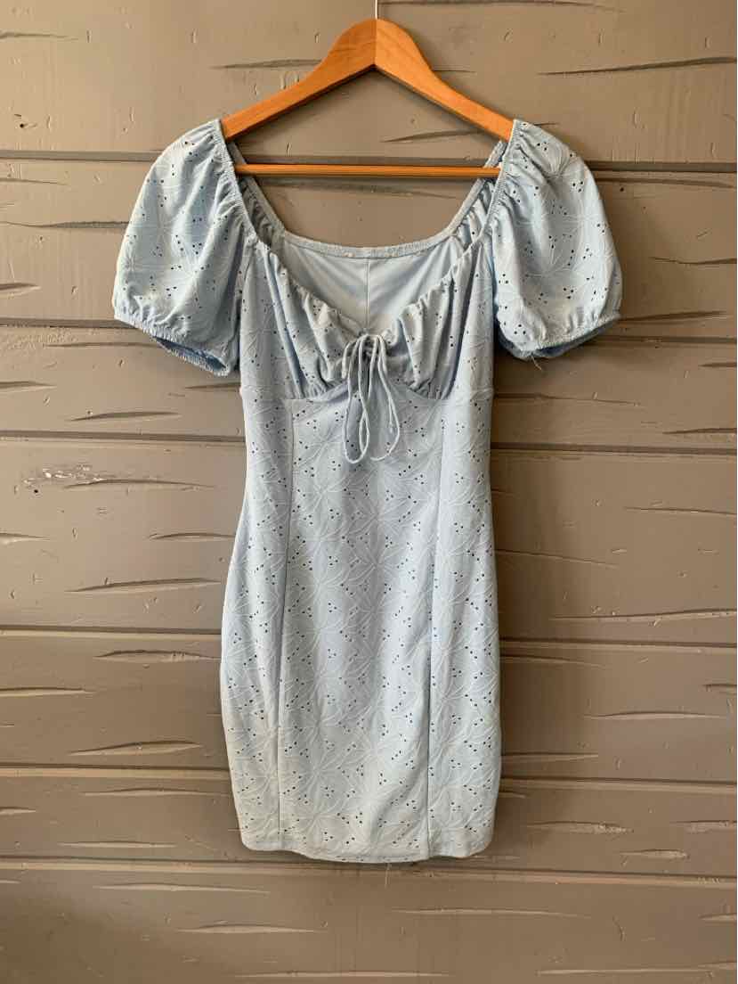 Light blue short dress with puff sleeves, square neckline, and front tie detail.