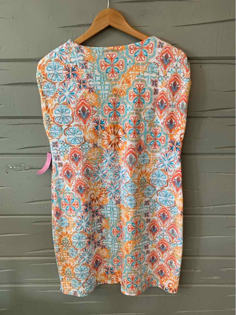 Orange and blue patterned knee-length dress with short sleeves on wooden hanger.