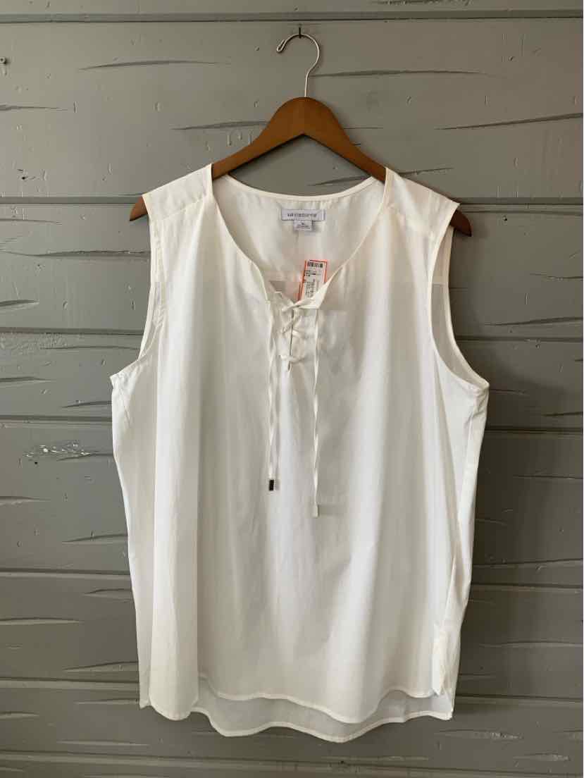 White sleeveless blouse with lace-up front detail, relaxed fit, and lightweight fabric.