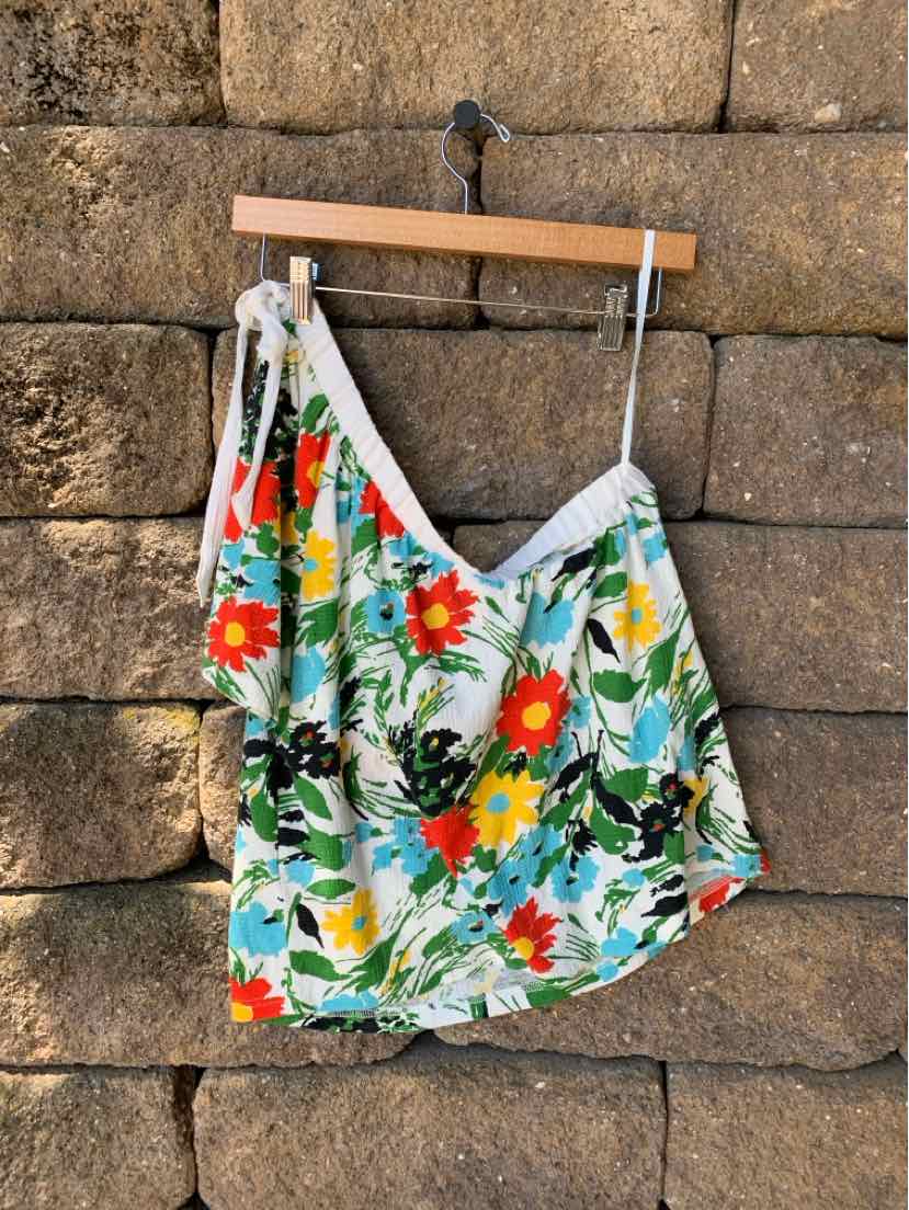 Floral print sleeveless camisole with adjustable straps in vibrant red, yellow, and green on white background.