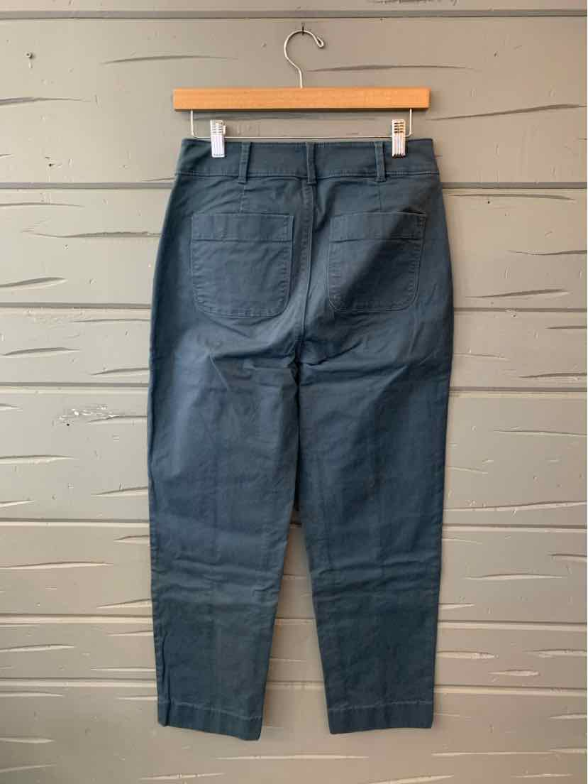 Dark navy straight-leg trousers with belt loops, front pockets, and a button closure.