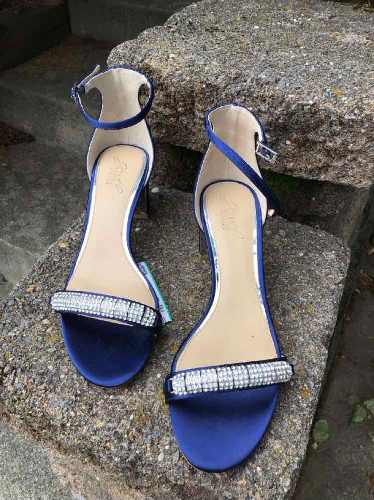 Navy blue satin strappy heels with rhinestone-embellished front strap and ankle buckle closure, size 10.